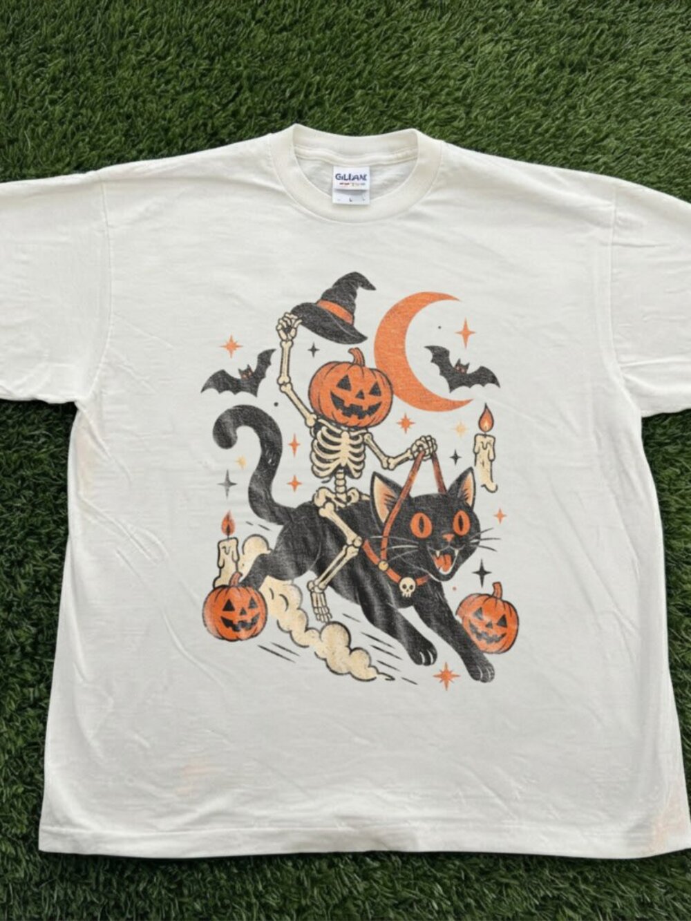 Gildan White A Skeleton Riding A Cat Graphic Tee
